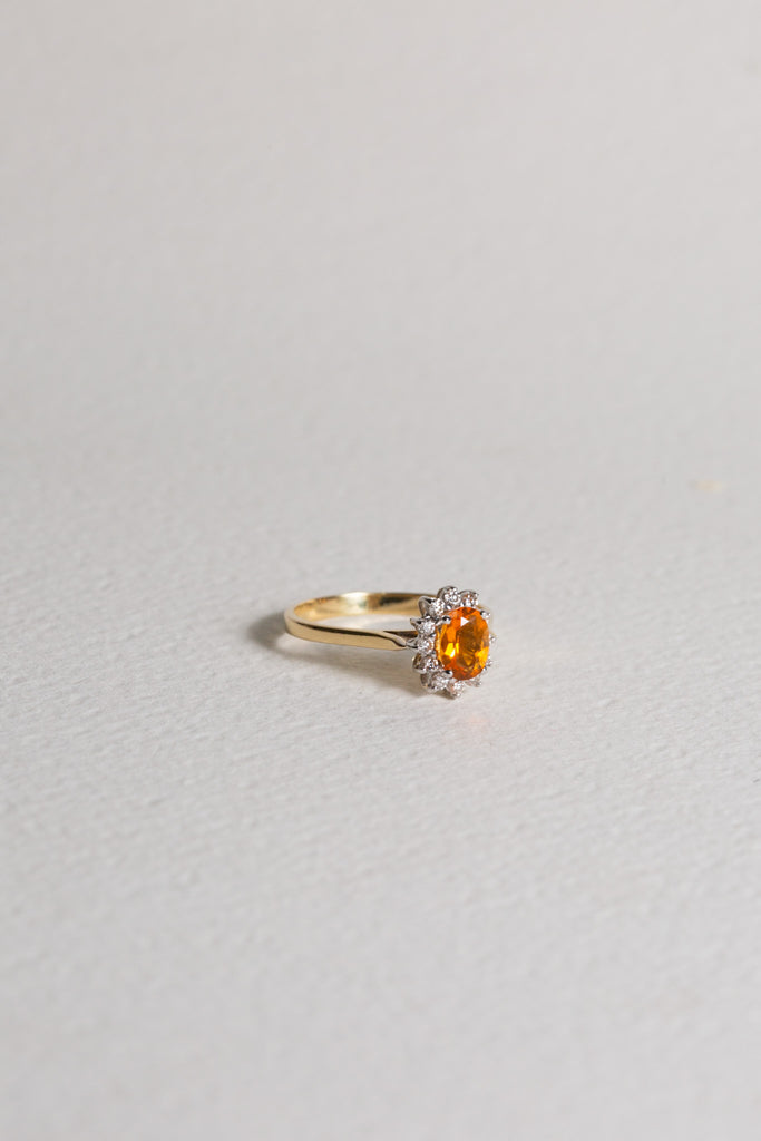 Fire Opal ring set in 18ct yellow gold