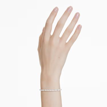 A model is wearing the Swarovski Matrix braclet