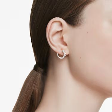 A model wearing the Swarovski Matrix hoop earrings