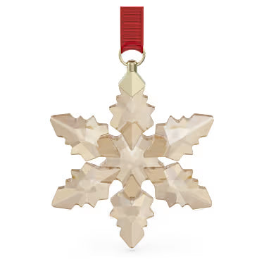 Swarovski crystal gold snowflake ornament, hanging from a red ribbon