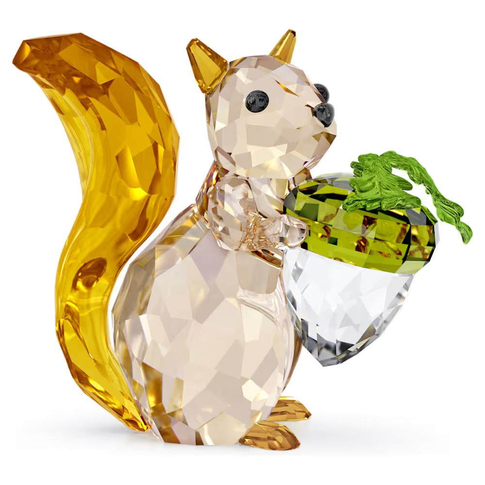 Swarovski crystal squirrel figurine holding an acorn